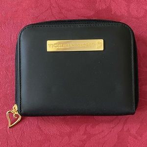 Victoria’s Secret black zipper wallet. NWOT,  Snap closure with compartments.